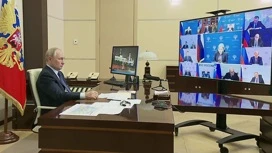 Путин провел видеоконференцию с членами правительства