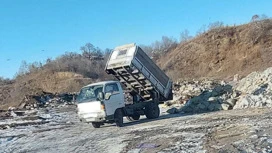 Организатора свалки возле села Томское поймали с поличным